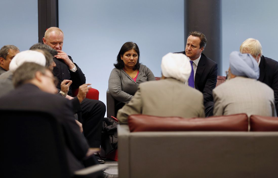 Prime Minister David Cameron with community members